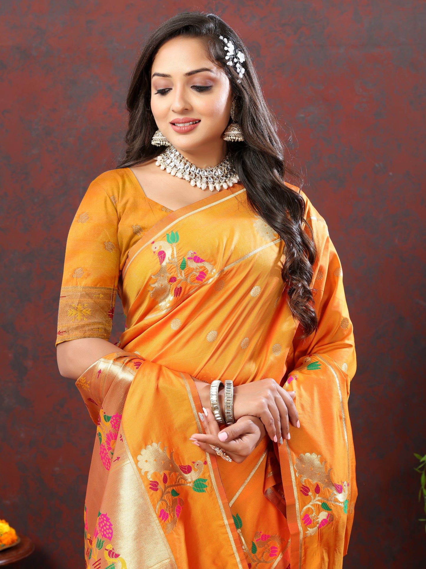 Soft Pethani Silk Orange Saree with Golden Zari Weawing Motifs